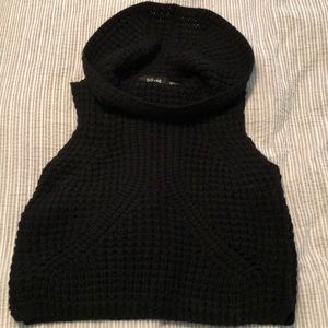 black sleeveless sweater